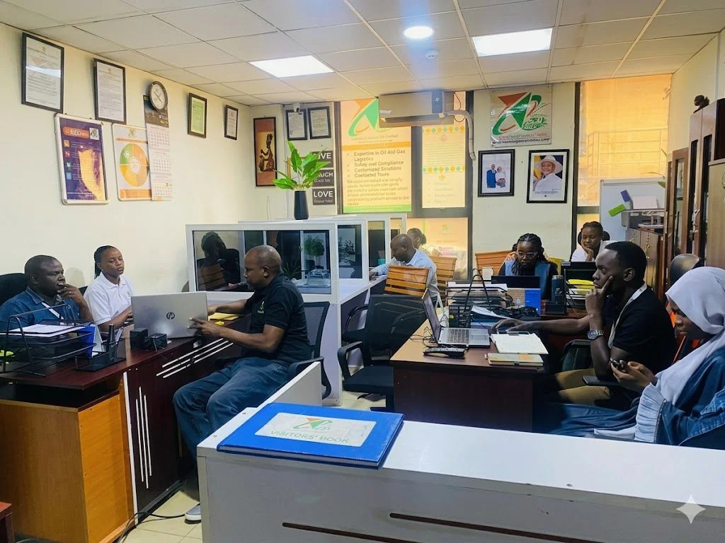 Vision Logistics careers - team working in the Kampala office